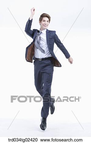 businessman jumping with excitement View Large Photo Image Stock Image - businessman jumping with excitement. Fotosearch