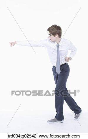 businessman punching with his fist View Large Photo Image Stock Image - businessman punching with his fist. Fotosearch