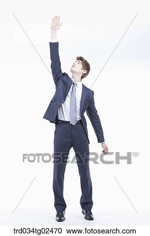 businessman reaching out his hand View Large Photo Image Stock Image - businessman reaching out his hand. Fotosearch