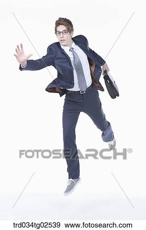 businessman rushing to work View Large Photo Image Stock Photo - businessman rushing to work. Fotosearch