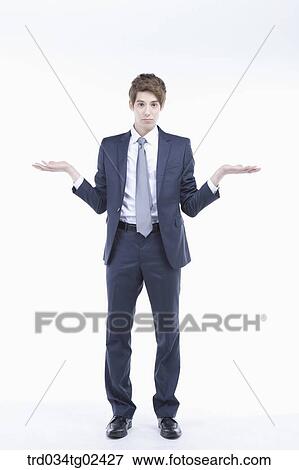 businessman shrugging with embarrassment View Large Photo Image Stock Photo - businessman shrugging with embarrassment . Fotosearch