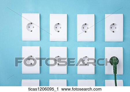 Electric outlets in three rows with a cord plugged in View Large Photo Image Stock Image - Electric outlets in three rows with a cord plugged in. Fotosearch
