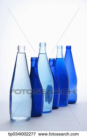 five bottles of water in a row View Large Photo Image Stock Photo - five bottles of water in a row . Fotosearch
