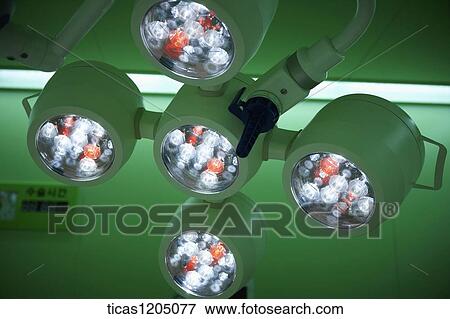 Five Surgical lights in a operating room View Large Photo Image Stock Photo - Five Surgical lights in a operating room. Fotosearch