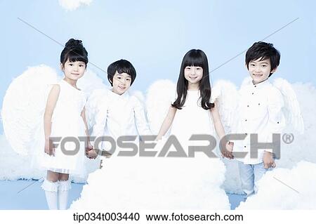 four kids with looks of angels on the clouds View Large Photo Image Stock Image - four kids with looks of angels on the clouds. Fotosearch
