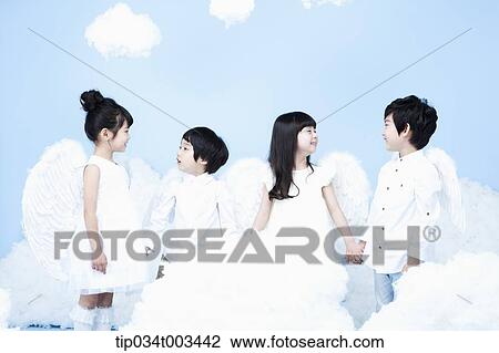 four kids with looks of angels on the clouds View Large Photo Image Stock Image - four kids with looks of angels on the clouds. Fotosearch