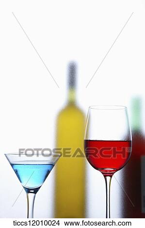 glasses of cocktail with bottles of wine View Large Photo Image Picture - glasses of cocktail with bottles of wine. Fotosearch