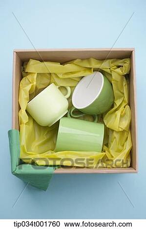 green cups in the box View Large Photo Image Stock Image - green cups in the box. Fotosearch
