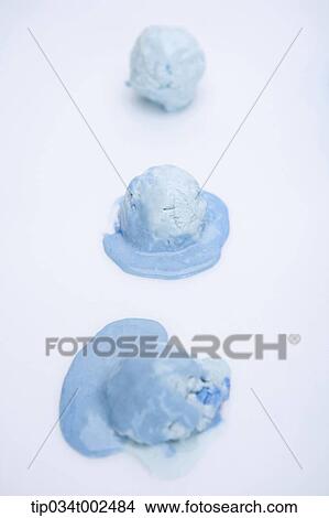 Picture - ice cream melting down. Fotosearch