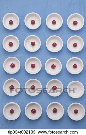 Stock Image - jelly candies in small dishes in rows. Fotosearch