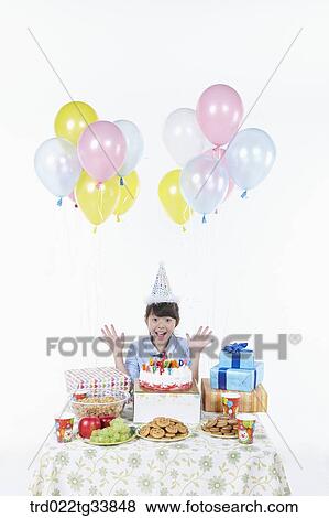 kid surprised at the birthday party View Large Photo Image Stock Photo - kid surprised at the birthday party . Fotosearch