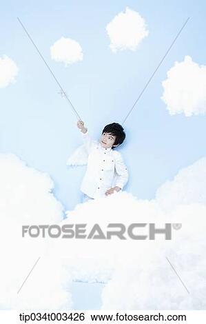 little boy looks of angel on the clouds View Large Photo Image Stock Photograph - little boy looks of angel on the clouds. Fotosearch