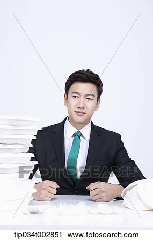 man being angry at a stack of disposable containers View Large Photo Image Stock Image - man being angry at a stack of disposable containers . Fotosearch