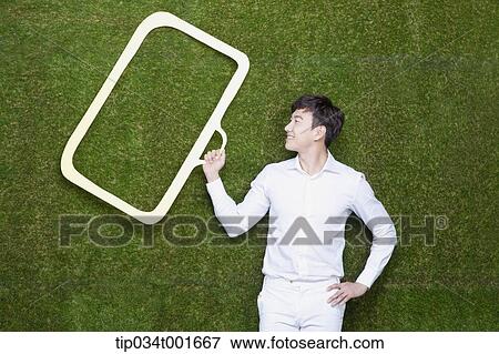 man holding a bag on his hand View Large Photo Image Stock Photo - man holding a bag on his hand. Fotosearch