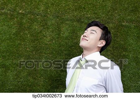 man taking a deep breath View Large Photo Image Stock Image - man taking a deep breath . Fotosearch