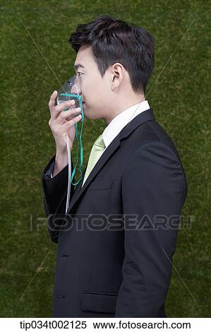 man wearing respirator View Large Photo Image Stock Photography - man wearing respirator. Fotosearch