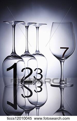 numbers inside an upside down wine glass with a number in proper wine glass View Large Photo Image Stock Photography - numbers inside an upside down wine glass with a number in proper wine glass. Fotosearch