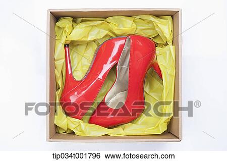 Stock Photograph - red shoes in the box. Fotosearch