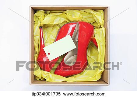 Stock Photography - red shoes in the box. Fotosearch