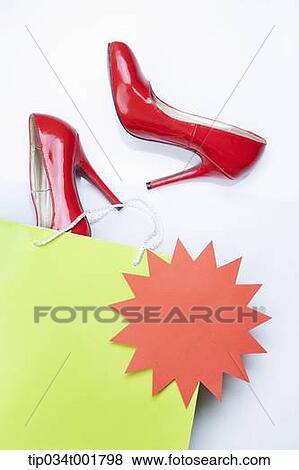 red shoes on discount View Large Photo Image Stock Photo - red shoes on discount. Fotosearch