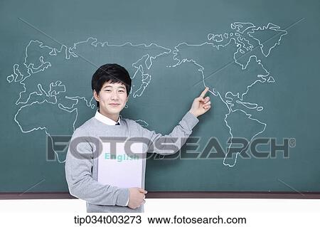 schoolboy pointing out one place in the world map in the blackboard View Large Photo Image Stock Image - schoolboy pointing out one place in the world map in the blackboard. Fotosearch