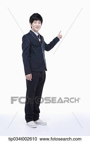 schoolboy pointing out with his index finger View Large Photo Image Stock Image - schoolboy pointing out with his index finger. Fotosearch