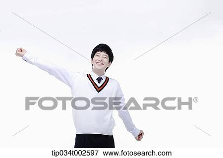 schoolboy stretching himself View Large Photo Image Stock Photo - schoolboy stretching himself. Fotosearch