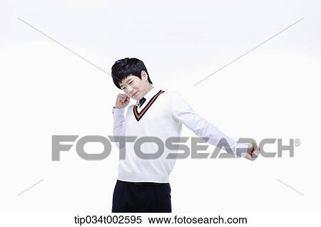 Stock Photography - schoolboy stretching himself. Fotosearch