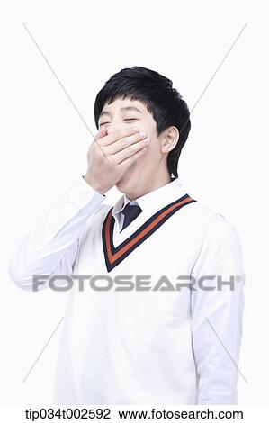 schoolboy yawing heavily View Large Photo Image Stock Image - schoolboy yawing heavily . Fotosearch