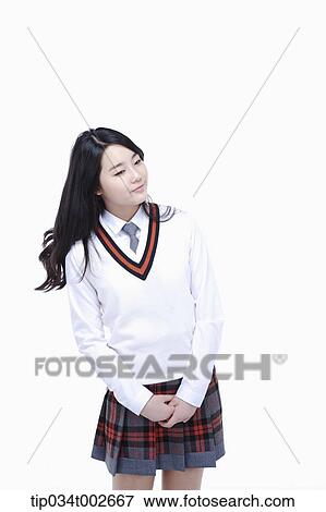 schoolgirl turning her head View Large Photo Image Stock Photo - schoolgirl turning her head. Fotosearch