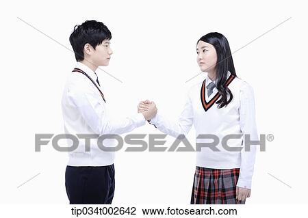 Stock Image - students pinkie-swearing each other. Fotosearch