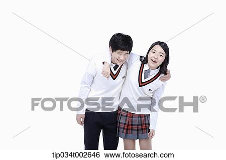 Stock Photograph - students putting arms around each other's shoulder. Fotosearch