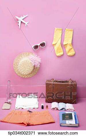 Stock Image - summer vacation items for woman. Fotosearch