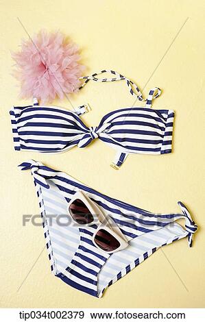 Stock Photo - summer vacation items for woman. Fotosearch