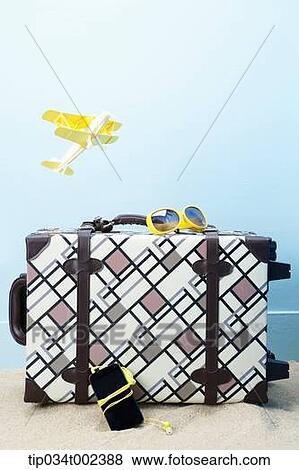 Stock Photo - summer vacation items for woman. Fotosearch