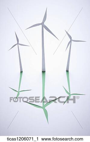 Three wind turbines with green shadows View Large Photo Image Stock Image - Three wind turbines with green shadows. Fotosearch