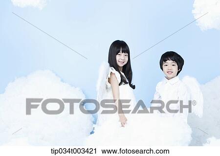two kids with looks of angels on the clouds View Large Photo Image Stock Image - two kids with looks of angels on the clouds. Fotosearch