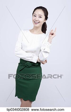 woman with her index finger up View Large Photo Image Stock Photo - woman with her index finger up . Fotosearch