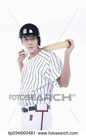 Stock Image - A baseball player putting the bat on his back. Fotosearch