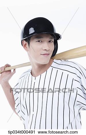 A baseball player putting the bat on his back View Large Photo Image Stock Image - A baseball player putting the bat on his back. Fotosearch