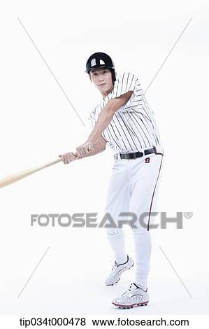 A baseball player swing the bat View Large Photo Image Stock Photo - A baseball player swing the bat. Fotosearch