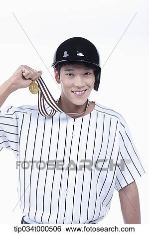 A baseball player with gold medal View Large Photo Image Stock Photograph - A baseball player with gold medal. Fotosearch