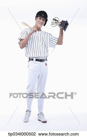 A baseball player with gold trophy View Large Photo Image Stock Image - A baseball player with gold trophy. Fotosearch