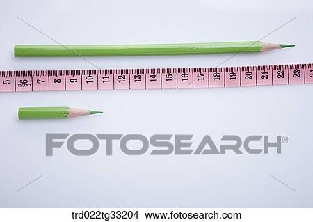A big pencil and a small pencil View Large Photo Image Picture - A big pencil and a small pencil. Fotosearch