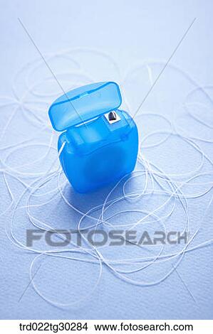 A blue dental floss View Large Photo Image Picture - A blue dental floss. Fotosearch