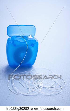 Stock Image - A blue dental floss. Fotosearch