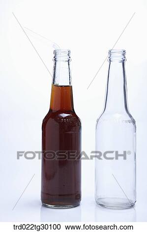 A bottle full of drink and another bottle being empty View Large Photo Image Stock Image - A bottle full of drink and another bottle being empty . Fotosearch
