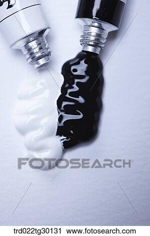 Stock Image - A bottle full of water, a bottle being empty, and crumpled bottle. Fotosearch