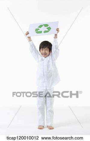 A boy holding up recycling symbol View Large Photo Image Stock Image - A boy holding up recycling symbol . Fotosearch