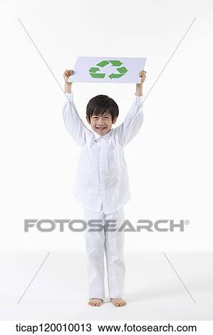A boy holding up recycling symbol View Large Photo Image Stock Image - A boy holding up recycling symbol . Fotosearch